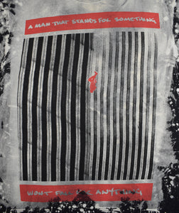 A MAN THAT STANDS FOR NOTHING WONT FALL FOR ANYTHING T-SHIRT ACID WASH BLACK