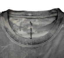 A MAN THAT STANDS FOR NOTHING WONT FALL FOR ANYTHING T-SHIRT ACID WASH BLACK